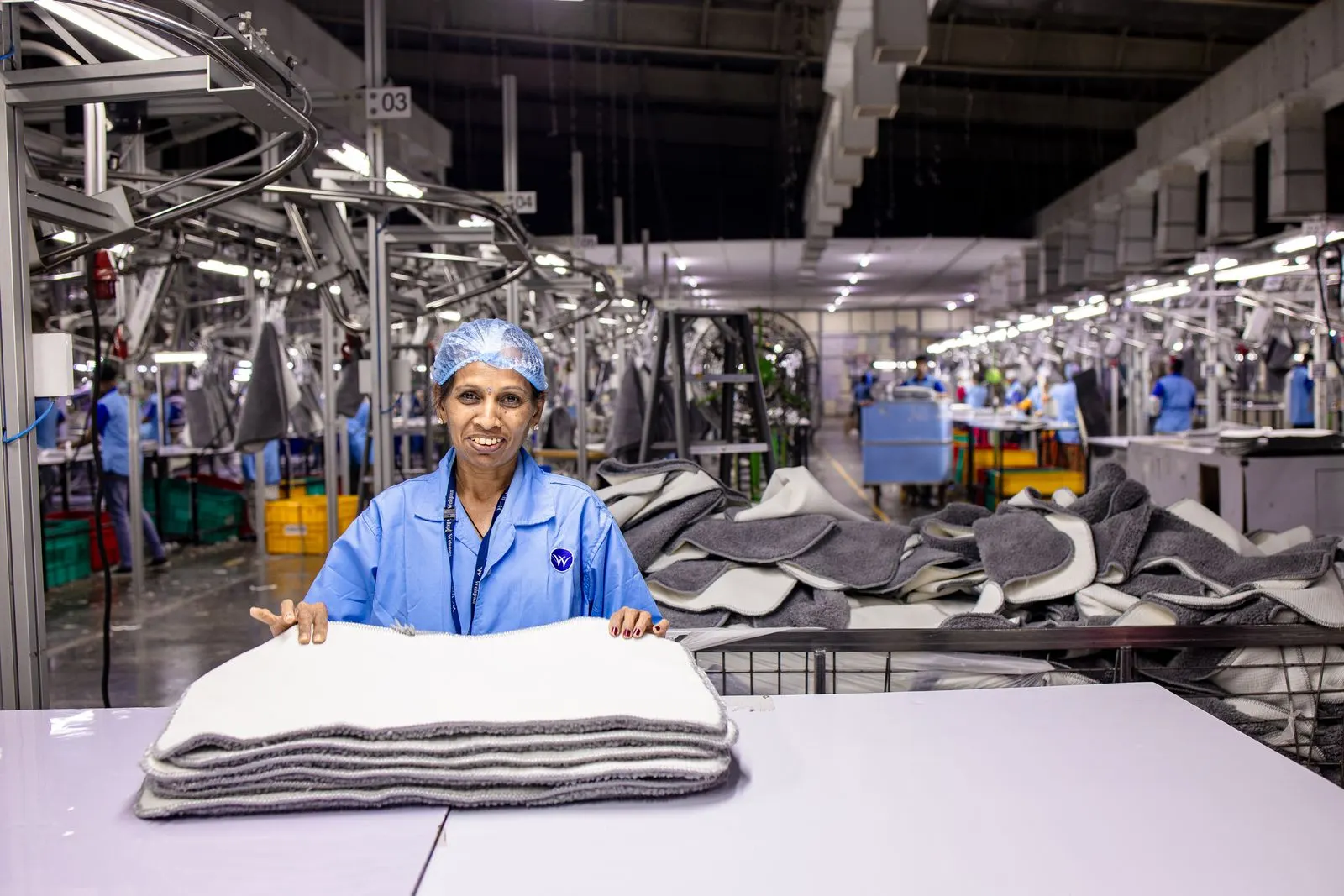 Workers on a factory floor
