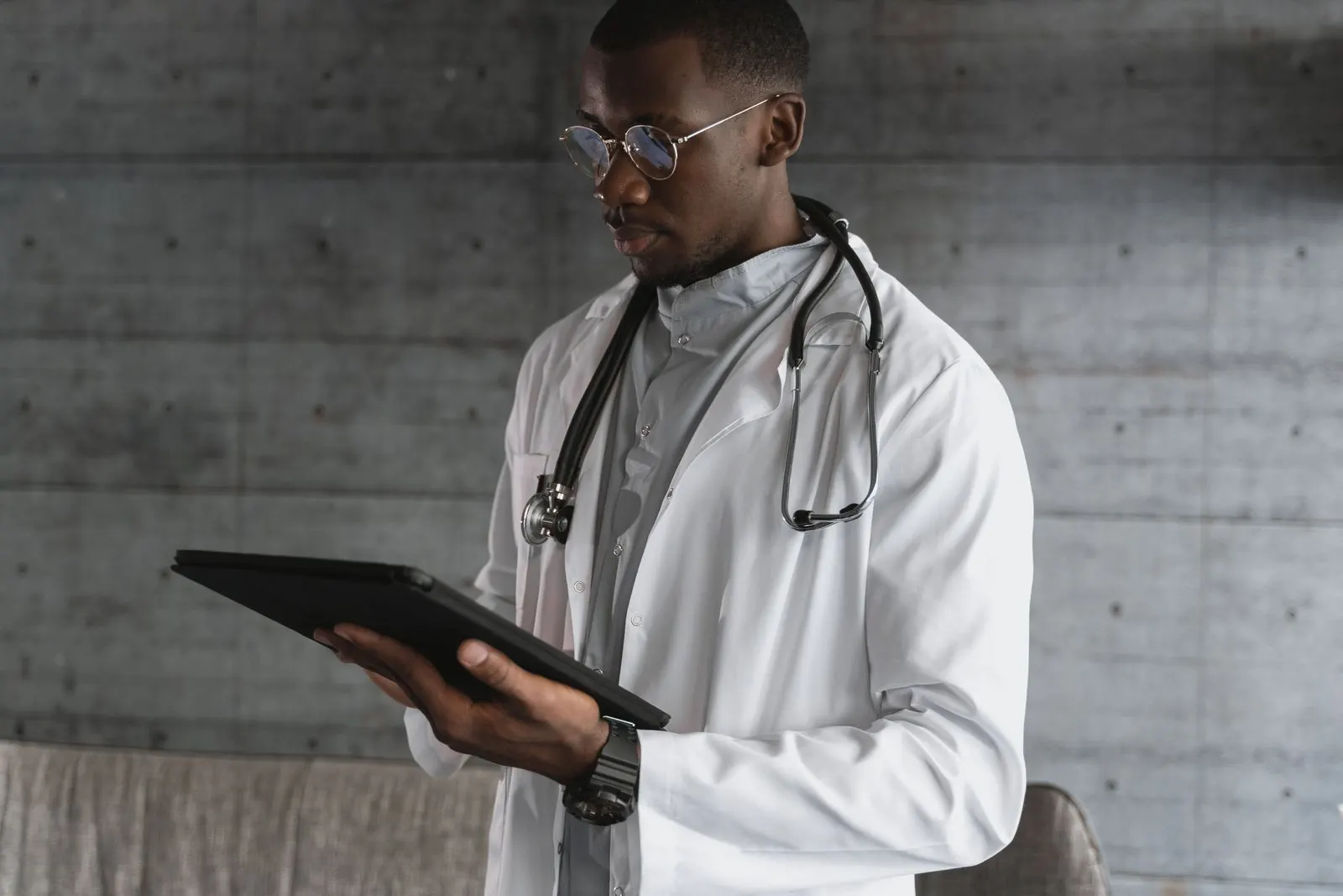 A healthcare worker using a tablet
