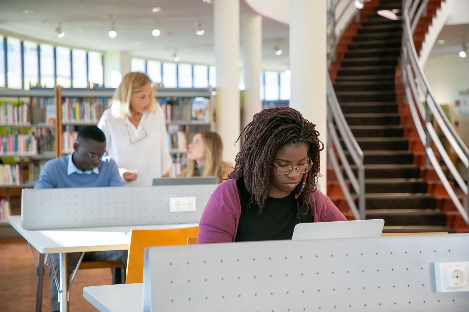 Students studying in a library